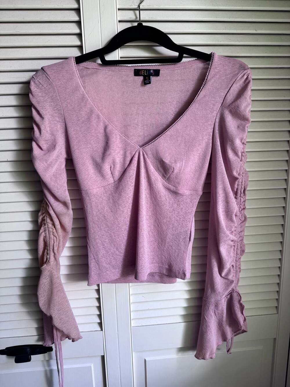 dELiA*s Lives In Daydreams Long Sleeve Ruched Flare Sleeve Top in Pink